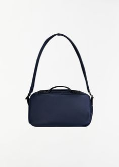 Simone Rocha navy crossbody bag with floral beaded embellishment in nylon. Features two front pockets with bows, an adjustable crossbody strap, and a zippered main compartment.
Measures approximately: 5.9 H x 9.8 W x 4.3 D in.
Color: Navy / Jet. 100% Polyester. Lining: 100% Polyester. Trims: 100% Polyester. Imported.
FW24SR028 Navy Shoulder Bag With Detachable Strap For Travel, Navy Crossbody Travel Bag, Navy Crossbody Shoulder Bag For Travel, Navy Functional Rectangular Shoulder Bag, Navy Crossbody Bag, Porter Yoshida, Wrap Cardigan, Fabric Bags, Fun Bags