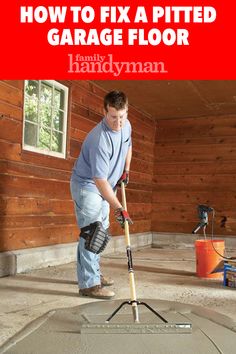 a man is cleaning the floor in his garage