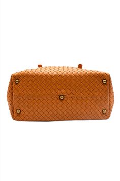 Sophisticated and sexy, this Bottega Veneta is perfect for everyday, or vacay! The Bottega Veneta Intrecciato Leather in Orange, throw on a trench coat and this bag and become Lauren Hutton in American Gigolo. This woven lambskin leather bag is made to the highest standards of quality. It also features a padlock on the side of the purse, and a small clochette and key attached to the adjustable straps. Designer: Bottega Veneta is an Italian luxury fashion house in Milan, Italy. Specialized in lea Luxury Woven Leather Shoulder Bag For Travel, Luxury Woven Leather Travel Shoulder Bag, Intrecciato Weave Shoulder Bag For Business, Classic Intrecciato Weave Shoulder Bag, Luxury Intrecciato Weave Shoulder Bag For Travel, American Gigolo, Lauren Hutton, Bottega Veneta Intrecciato, Bottega Veneta Shoulder Bag