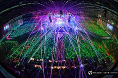 an aerial view of a concert venue with many lights and sound effects on the ceiling