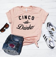 Cinco De Cinc - Unisex Short Sleeve T-Shirt .  We use Bella + Canvas 3001 premium t-shirts which have a soft and light feel, It's very comfy and with it's unisex sizing it's perfect for both men and women. Main Image is Heather Peach BRAND & MATERIAL: Bella + Canvas - Unisex Short Sleeve Jersey Tee - 3001 - 4.2 oz., 100% airlume combed and ringspun cotton, 32 singles - Athletic Heather and Black Heather are 90/10 airlume combed and ringspun cotton/polyester  - Ash is 99/1 airlume combed and ringspun cotton/polyester - Alternate Heather CVC/Blend colors are 52/48 airlume combed and ringspun cotton/polyester  - Heather Prism colors are 99/1 airlume combed and ringspun cotton/ polyester (Unique coloring, grey flecks of heather pulled through the base color) - Side seams, retail fit - Shoulder Mom Daughter Shirts, Mimi Shirts, Hairstylist Outfits, Hair Stylist Shirts, Funny Pregnancy Shirts, Daughter Shirts, Gigi Shirts, 30th Birthday Shirts, Pregnancy Reveal Shirt