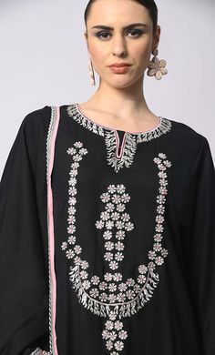 Introducing our enchanting 3-piece Salwar Kameez with Dupatta set, where traditional craftsmanship meets contemporary style. This set features stunning machine embroidery adorned with delicate sequins work, adding a touch of glamour and sophistication to your ensemble. Each piece is meticulously crafted to perfection, ensuring that every stitch and detail exudes elegance and charm. Whether you're attending a festive celebration or a formal event, this Salwar Kameez set promises to elevate your look with its timeless appeal and exquisite craftsmanship. Experience the epitome of luxury and grace with our 3-piece Salwar Kameez set, designed to make you shine on every occasion. Size & Fit Model height is 5’9’ and is wearing a Small sizeMaterial & CareMaterial: Rayon Care: Gentle machine wash i Black Salwar, Kids Abaya, Black Salwar Kameez, Neck Designs For Suits, Mens Items, Dupatta Set, Kids Items, Womens Loungewear, Shine On