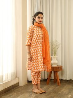 Beautiful handcrafted straight kurta pants set in pure cotton with lovely matching cotton doriya dupatta that is rightly finished with mirror embroidery. Color: Orange Fabric: Cotton and Kota Doria Note: Length and sizes can be customised Length - Kurta 40 inches Pants 38 inches Available in other colors If you happen to see some deformity in hand-work or fabric, that’s mere the technique of the same and not a defect. The garment is quite premium. The product will be delivered within 20-25 days Cotton Palazzo Set With Gota Work, Block Print Cambric Straight Kurta Set, Mulmul Straight Kurta Set With Block Print, Cotton Unstitched Suit With Block Print For Festivals, Bollywood Style Cotton Unstitched Suit With Block Print, Mulmul Sets With Block Print And Straight Kurta, Cotton Saree Set With Gota Work, Festive Cambric Kurta With Block Print, Festive Block Print Cambric Kurta