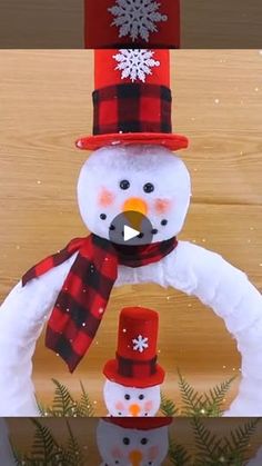 a snowman made out of foam with a red hat and scarf around his neck