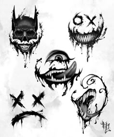 some scary faces drawn in ink on white paper