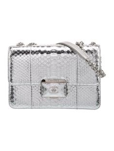 Chanel Shoulder BagFrom the 2015-2016 Collection by Karl LagerfeldMetallic & Silver PythonInterlocking CC LogoSilver-Tone HardwareChain-Link Shoulder StrapsLeather Lining & Single Interior PocketPush-Lock Closure at FrontIncludes Box & Dust BagUnfortunately, due to restrictions, this item may not be eligible for shipping in all areas. Luxury Shoulder Bag With Silver-tone Logo Plaque, Luxury Formal Shoulder Bag With Silver-tone Logo Plaque, Luxury Metallic Bag With Silver-tone Logo Plaque, High-end Silver Shoulder Bag, Chanel Chain, Classical Style, Belt Shop, Designer Gifts, Chanel Shoes