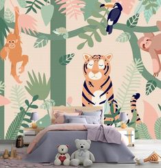 an animal themed bedroom with jungle wallpaper