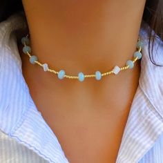 - Beaded choker necklace with 14K gold plated ball beads, pearly clover beads and light pastel blue colored beads! - super cute, dainty and perfect for layering! - AVOID WATER if possible! - HANDLE WITH CARE💌 - about 14 1/4 inches (one general size) Dainty Choker With Round Gold Beads, Gold Choker With Round Beads For The Beach, Gold Dainty Crystal Necklace With Colorful Beads, Dainty Gold Crystal Necklace With Colorful Beads, Gold Choker With Colorful Round Beads, Gold Choker With Colorful Beads For Beach, Gold Choker With Gemstone Beads, Gold Dainty Jewelry, Colorful Preppy