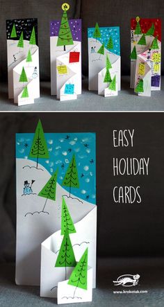 four different christmas cards with trees and snow on them, one is made out of paper