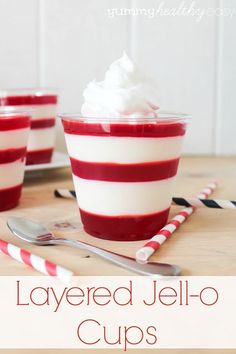 layered jello cups with whipped cream and candy canes on the side for dessert