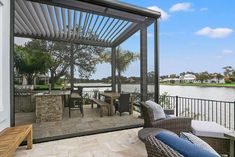 Modern Outdoor Kitchen Pergola Transformation | Azenco Outdoor Screened Pergola, Outdoor Kitchen Pergola, Kitchen Pergola, Motorized Pergola, Pergola Screens, Outdoor Kitchen Area, Covered Outdoor Kitchens, Residential Exterior