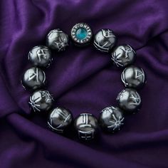 Product Details Official licensed Marvel product RockLove is the creator of the original 2018 Kimoyo Beads in collaboration with Marvel Studios RockLove donated to UNCF in celebration of Marvel Studios’ Black Panther Legacy 2022 Nickel free artisan brass Black rhodium plated  18mm diameter beads strung on durable heavy Handmade Symbolic Black Beaded Bracelets, Festival Black Bracelets With Large Beads, Black Festival Jewelry With Letter Beads, Black Letter Beads Jewelry For Festivals, Black Stretch Bracelet With Round Beads For Festival, Black Spiritual Jewelry With Letter Beads, Black Panther Jewelry, Steampunk Bag, Iphone Wallpaper Blur