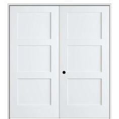 two white doors with black knobs on each side