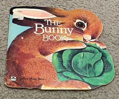 the bunny book is sitting on the floor