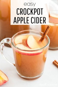 an easy crockpot apple cider recipe with apples and cinnamon in the background