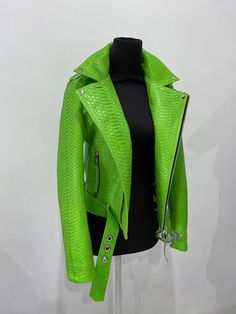 Green Snakeskin Jacket PREMIUM QUALITY LUXURY STYLE Outside: Snakeskin Accessories: golden color (please see the photo). All our products are 100% handmade, we always try to create interesting ideas to make your style unique. We use only the highest quality materials and accessories from around the world and only best leather from Indonesia. Before listing each new model undergoes different quality and usability tests at every stage of production. Every single piece is made by hand, by a highly- Luxury Green Biker Jacket With Zipper, Luxury Fitted Green Biker Jacket, Neon Green Leather Jacket, Luxury Designer Green Outerwear, Luxury Green Leather Outerwear, Luxury Functional Green Outerwear, Luxury Green Outerwear With Zip Fly, Luxury Green Leather Jacket For Winter, Luxury Green Outerwear