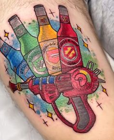 a man's thigh with different colored bottles on it