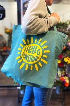 Hello Sunshine Premium Canvas Tote Bag – Perfect for everything from summer trips to the beach or daily trips to the farmers market. Fit all your goodies in this oversize sunny tote bag. Akinz Flannel Jacket Women's, Colorado Shirt, Adventure Accessories, Long Tee Shirts, Hooded Cowl, Kids Beanies, Oversized Tote Bag, Puff Print, Oversized Tote