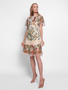 Shop for Kimora Embroidery Mini Dress at Glory Connection. Free shipping on orders over $75. Composition: Cotton, Mesh, Polyester Washing instructions: Dry Clean Model is wearing size S Designer Style ID: GC58-73451 Spring Floral Short Sleeve Dresses, Embroidered Knee-length Midi Dress For Garden Party, Beige Floral Embroidery Midi Dress For Garden Party, Feminine Short Sleeve Dresses With Floral Applique, Beige Floral Embroidered Dress For Garden Party, Beige Floral Embroidery Dress For Garden Party, Floral Embroidered Midi Dress For Garden Party, Beige Embroidered Midi Dress For Spring, Floral Print Knee-length Embroidered Dress For Garden Party