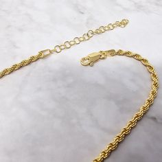 The rope chain necklace is an effortless essential. Dipped in gold, it provides you with affordable every day luxury.  This eye catching piece combines high quality craftsmanship and precious metal without the hefty price tag. Ethically-sourced and affordable, so you can look as good as you feel, every day.  This jewellery arrives beautifully packaged and ready to gift. It would make a really thoughtful and meaningful birthday gift, Christmas gift, Mother's Day gift, Valentine's Day gift, annive Minimalist Gold-plated Rope Chain Necklace, Minimalist Gold Plated Rope Chain Necklace, Minimalist Yellow Gold Rope Chain Jewelry, Minimalist Gold Rope Chain Necklace, Minimalist Yellow Gold Rope Chain Necklace, Rope Chain Necklace For Everyday, Everyday Rope Chain Necklace, Yellow Gold Rope Chain Necklace Gold Plated, Elegant 14k Gold Tarnish Resistant Rope Chain Necklace