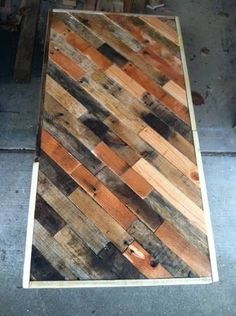 the floor is made out of wood planks and has been laid on top of it