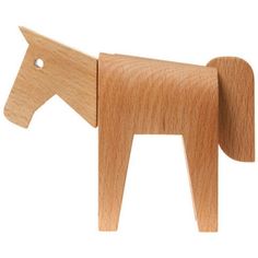 a wooden toy horse that is standing up against a white background with the shape of a horse on it's head