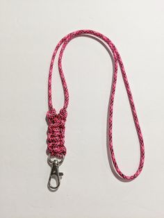 "Minimalist Paracord or Parachute Cord ID Lanyard I made this with a Multi-Colored parachute cord (Paracord 550) and it is knotted at the bottom by the id clip. The ends are melted into the back of the knots. The Overall Length of the Lanyard is about 18\". (From the back of the neck to the end of the Lobster Claw ID clip) Paracord 550 is: 4mm in diameter 7 inner strands Polyester Choose the break away option for the pull apart plastic clasp to be added to the back of the neck area of the lanyar Macrame With Paracord, Paracord Keyring, Paradors Lanyard Diy, Paracord Lanyard, Parachute Cord Necklace, Parachute Cord Lanyard Diy, Paracord Neck Lanyard, Knife Lanyard Paracord, Paracord Accessories