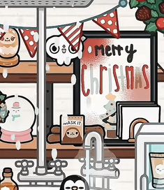 there are many items on the shelf in front of the christmas card display window, and one is holding a teddy bear