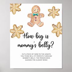 a white card with gold foil snowflakes and a ginger on it that says how big is mommy's belly?