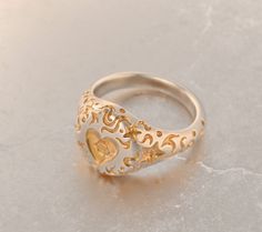 Meaningful signet for her, which translates wish making and life. Black and gold design, silky satin finish with warm golden details -925 Silver with high karat yellow gold plating -Weight~7 gm Please allow up to 2-3 weeks for production, as each item is made to order. Luxury Polished Finish Heart Ring As Gift, Elegant Engraved Heart Ring As Gift, Gold Heart Engraved Wedding Ring, Elegant Engraved Gold Heart Ring, Luxury Heart Ring With Polished Finish As Gift, Elegant Gold Heart-shaped Engraved Ring, Luxury Polished Finish Heart Ring For Gift, Luxury Gold Heart Ring As Gift, Gold Heart-shaped Engraved Wedding Ring