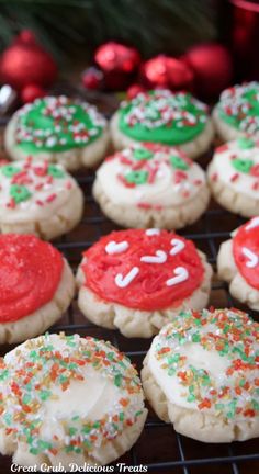 Rows of mini cookies decorated in white, red, and green frosting and Christmas themed sprinkles. Corn Wontons, Mini Cookies Recipe, Mini Christmas Cookies, Pig Shots, Pecan Scones, Ham Broccoli, Mississippi Chicken, Brisket Tacos, Pecan Cobbler