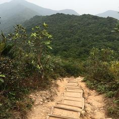 a set of steps leading up to the top of a mountain