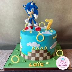 a birthday cake with sonic the hedgehog on top