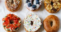 six doughnuts with different toppings are arranged in a circle