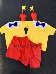 two children's costumes made to look like they are wearing red shorts and yellow shirts