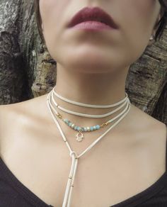 "Boho Hamsa Necklace, Yoga Jewelry, Delicate Choker Necklace, Gold Wrap Necklace, Minimalist Wrap Choker, Suede Choker, Boho Tie Up Necklace ❤ BUY ANY 2 ITEMS ANS GET 15% OFF!! (USE COUPON CODE '15OFF') ❤ ❤ BUY ANY 4 ITEMS ANS GET 20% OFF!! (USE COUPON CODE '20OFF') ❤ ❤ BUY ANY 6 ITEMS AND GET 25% OFF!! ((USE COUPON CODE '25OFF') ❤ Complete any outfit with this unique gorgeous fashionable and trendy delicate Hamsa choker wrap necklace ! Made from one long 3x1mm suede leather cord, 6mm faceted ro Adjustable Minimalist Layered Choker Necklace, Layered Pendant Necklace With Adjustable Chain, Adjustable Long Clavicle Chain Choker, Minimalist Adjustable Choker Necklace, Adjustable Bohemian Lariat Necklace With Delicate Chain, White Adjustable Chain Layered Choker Necklace, Delicate Adjustable Everyday Choker, Bohemian White Charm Necklace With Adjustable Chain, White Bohemian Charm Necklace With Adjustable Chain