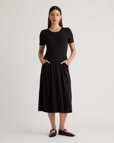 We took the comfy feel of a T-shirt dress and elevated it with beautifully draped details. Crafted in stretchy-soft, breathable Tencel™ jersey fabric, this streamlined midi dress features light ruching at the shoulders and a softly pleated skirt for a more fluid—and flattering—shape. And because no dress is complete without pockets, we included one on each side. Dress it down with sneakers or add heels and hit the town—this effortless style is up for anything. Post Mastectomy Clothing, Mastectomy Clothing, Dress With Sweater, Trendy Summer Fashion, Fall Midi, Lil Black Dress, Side Dress, Short Sleeve Midi Dress, Style Lounge