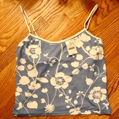 Nwt J Crew Blue Floral Print Cami Size Medium With Adjustable Straps And Built In Shelf Bra. Approx. 15 Inch Length Not Including Straps. Light Blue Camisole Tank Top For Spring, Light Blue Cotton Sleeveless Camisole, Light Blue Stretch Camisole Top, Light Blue Fitted Cami Top, Fitted Light Blue Cami Top, Blue Stretch Camisole Top, Blue Cotton Cami Top, Light Blue Camisole For Spring, Fitted Blue Floral Print Camisole