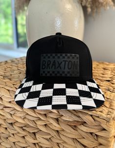 Introducing our black toddler snapback with a stylish checkered bill, designed for both comfort and flair. Available in two sizes - toddler and child - ensuring the perfect fit for your little one as they explore the world. Crafted with care and attention to detail, this hat is a must-have addition to any young trendsetter's wardrobe. Order yours today and let your child's style shine! please measure your child's head-  toddler 18-21 inches- 21 inches would be with the adjustable band being comp Adjustable Flat Bill Baseball Cap, Adjustable Plaid Hat With Curved Brim, Plaid Adjustable Curved Brim Hat, Adjustable Plaid Cap, Casual Adjustable Gingham Hat, Child Hat, Baby Boy Hat, Black Toddler, Boy Toddler