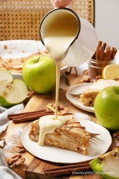 someone pouring caramel sauce on an apple pie