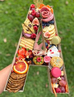 a letter made out of food is shown in the shape of a fruit and vegetable alphabet