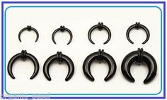 six pairs of black metal hooks