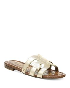 Sam Edelman Women's Bay Slide Sandals Classic Gold Sandals For Summer, Classic Gold Sandals With Leather Footbed, Classic Gold Closed Toe Sandals, Leather Slides In Tan For Summer, Gold Open Toe Sandals With Leather Lining, Classic Gold Leather Sandals, Classic Tan Sandals For Summer, Designer Summer Mules With Leather Footbed, Gold Sandals With Leather Lining For Summer