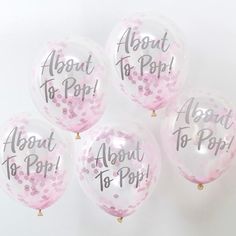 five balloons with the words about to pop written on them, all in pink and white