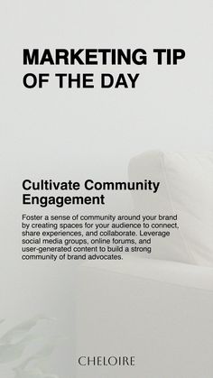 a white couch sitting next to a plant on top of a wooden table with the words marketing tip of the day written above it