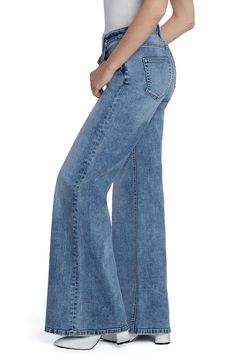 Floor-sweeping wide legs bring a stunningly chic look to these cleanly styled mid-rise jeans made with a hint of shape-retaining stretch. 32" inseam; 25 1/2" leg opening; 9 1/2" front rise Zip fly with button closure Five-pocket style 66% cotton, 22% REPREVE® recycled polyester, 8% polyester, 3% rayon, 1% spandex REPREVE recycled polyester is made from 100% post-consumer recycled plastic bottles Machine wash, tumble dry Imported Blue Wide Leg Flares With Five Pockets, Chic Washed Blue Wide Leg Flare Jeans, Chic Medium Wash Full Length Flares, Chic Medium Wash Wide Leg Flares, Stretch Wide Leg Flare Jeans With Five Pockets, Light Wash Wide Leg Denim Flares, Denim Blue Flares With Five Pockets, Casual Blue Wide Leg Flares, Chic Mid-rise Washed Blue Flare Jeans