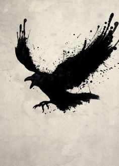 a black bird flying in the sky with ink splatters on it