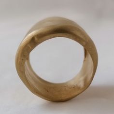 Gold Thick Band Ring As Gift, Gold Wide Band Ring As Gift, Gift Gold Thick Band Ring, Thick Band Recycled Gold Ring As Gift, Thick Band Recycled Gold Ring For Gift, Gold Bands Made Of Recycled Gold, Gold Bands Made From Recycled Gold, Gold Recycled Gold Bands, Yellow Gold Brass Rings With Thick Band