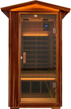 an empty sauna in a wooden frame with lights on the side and shelves behind it