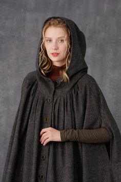 Gothic Hooded Winter Cape, Witchy Outerwear For Fall Costume, Gothic Winter Cape Outerwear, Hooded Cape For Larp In Fall, Hooded Fall Cape For Larp, Gothic Cape Outerwear For Winter, Elvish Cosplay Outerwear For Fall, Elvish Outerwear For Fall Cosplay, Medieval Style Cape For Larp In Fall